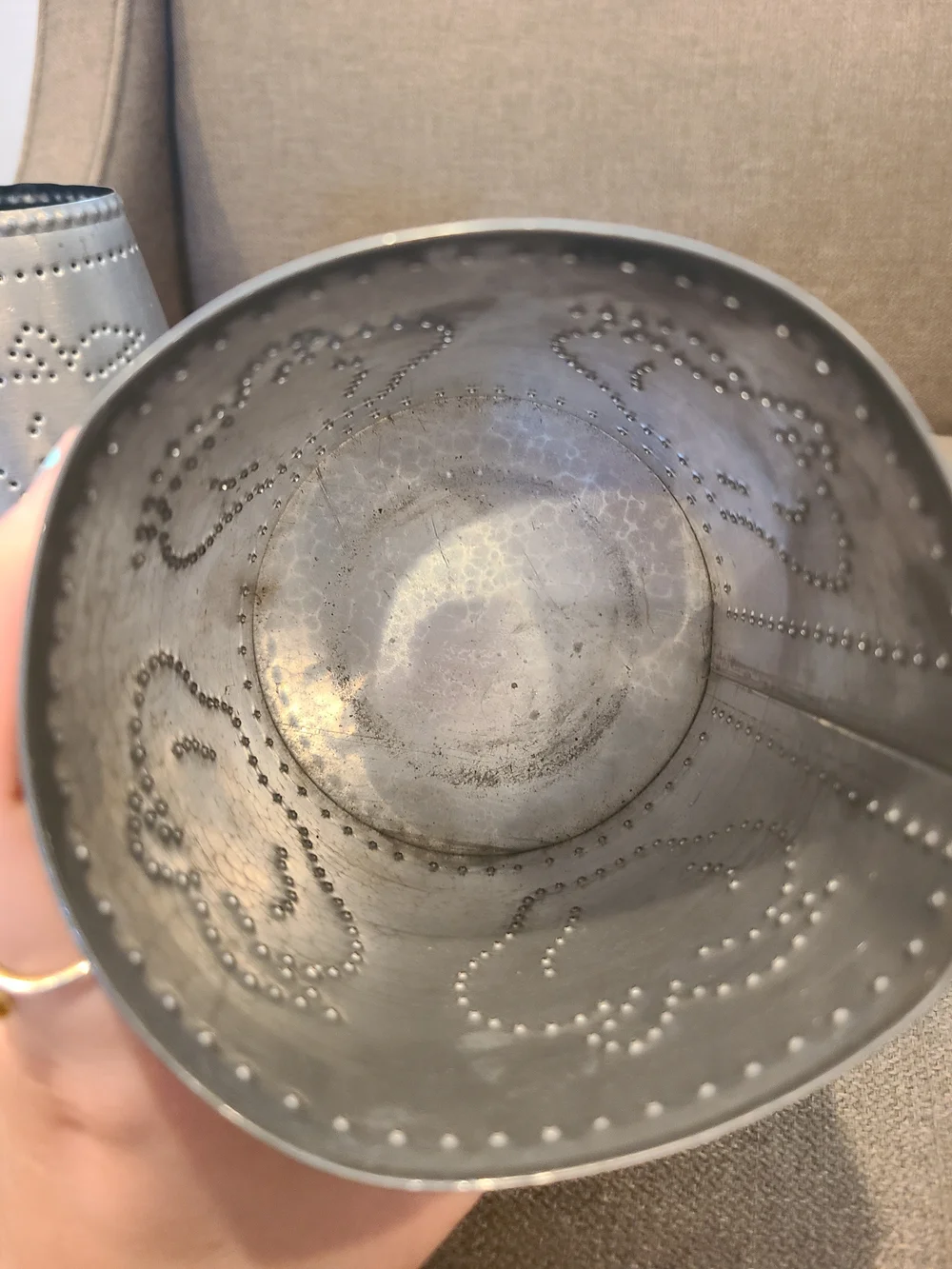 Primitive Irvin's Punched Tin Lamp featuring a distinct apple